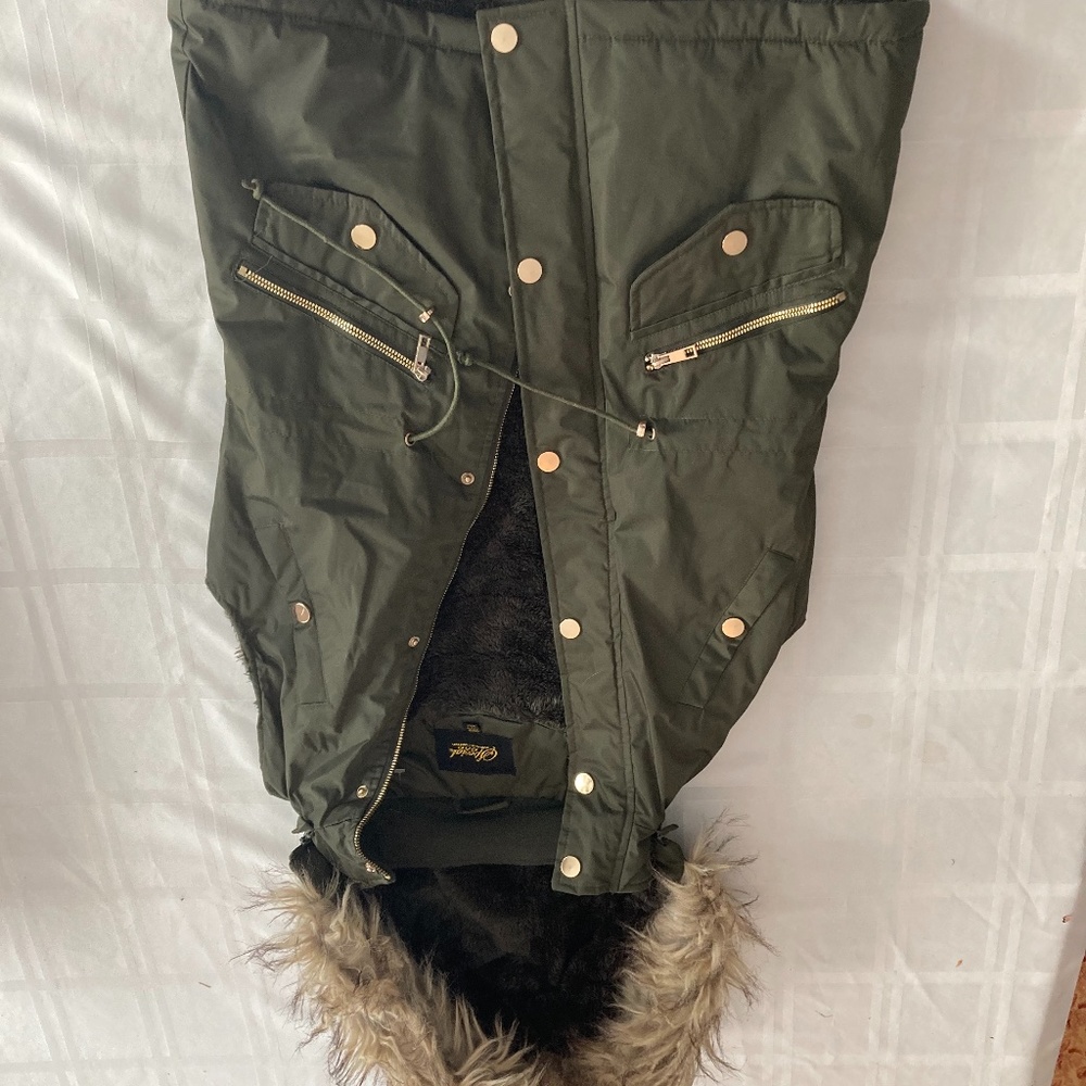 Stunning and stylish winter vest with faux fur lined hood